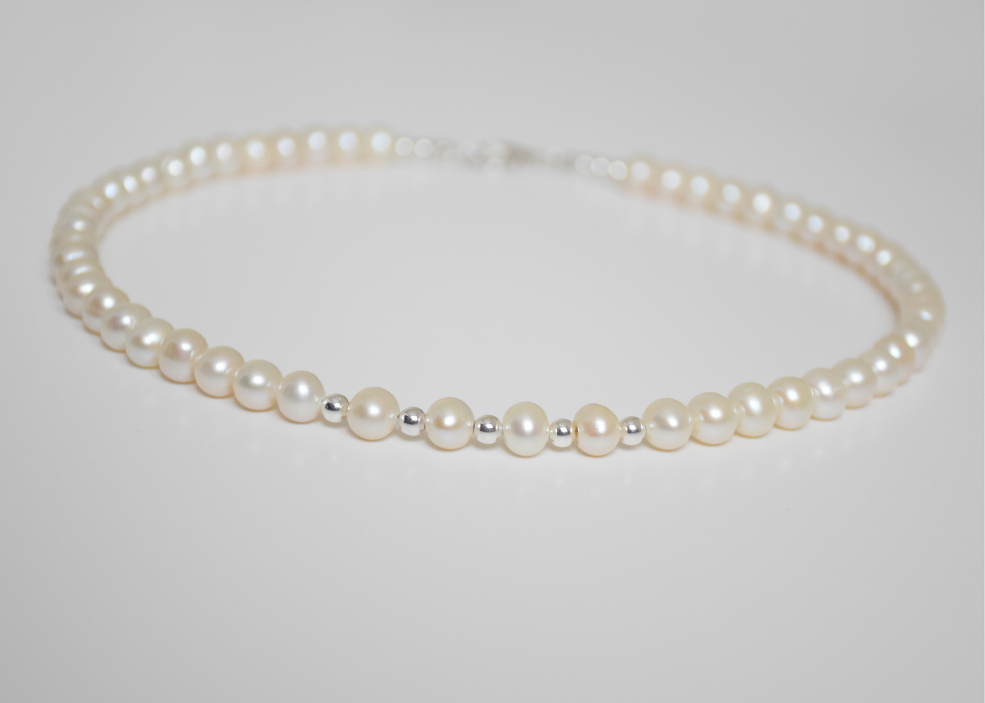 Pearl Necklace made by Swarovski Pearls.